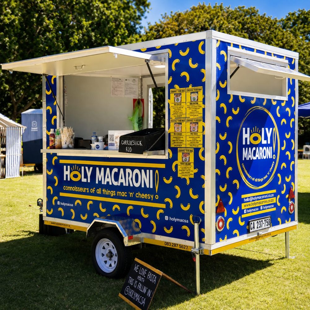 Holy Macaroni food truck at an outdoor event